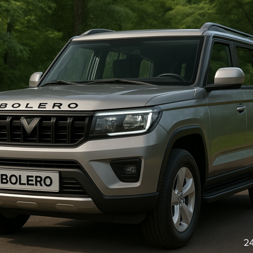 Mahindra Bolero SUV driving on a jungle road